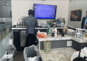 a man standing at a bar