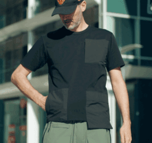 a man in a black shirt and hat