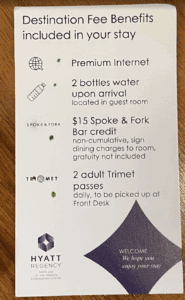 a white sign with black text and black text on it