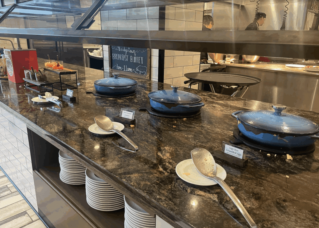 a kitchen counter with plates and bowls