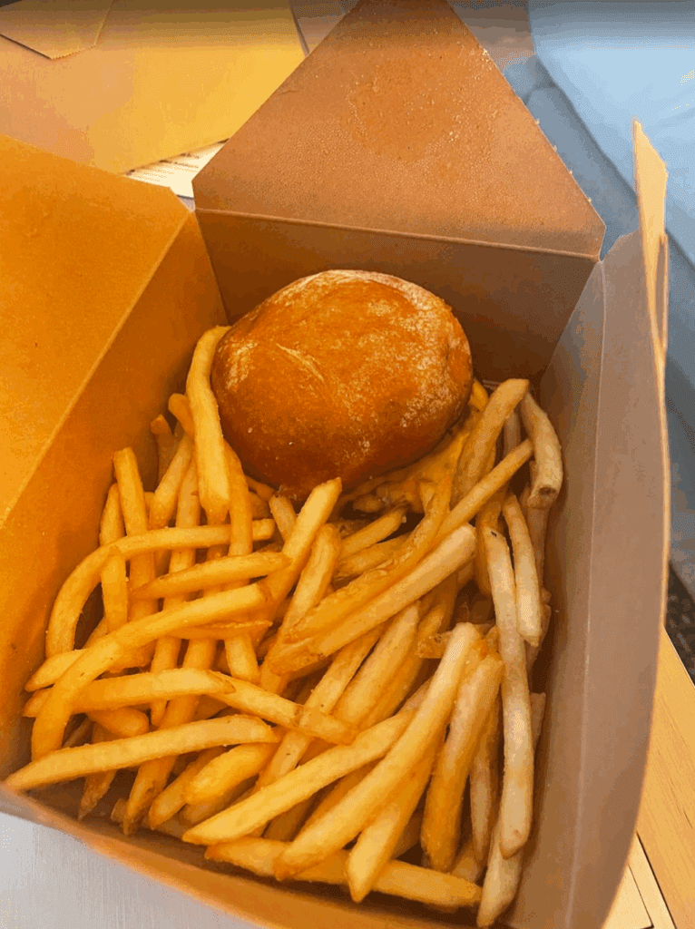 a burger and fries in a box