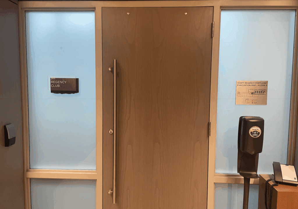 a door with a metal handle