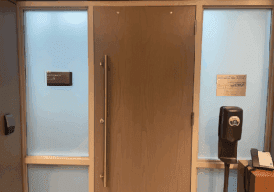 a door with a metal handle