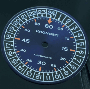 a circular blue and white dial with white numbers