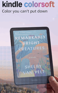 a hand holding a tablet