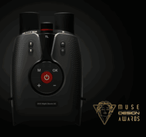 a black device with a red button