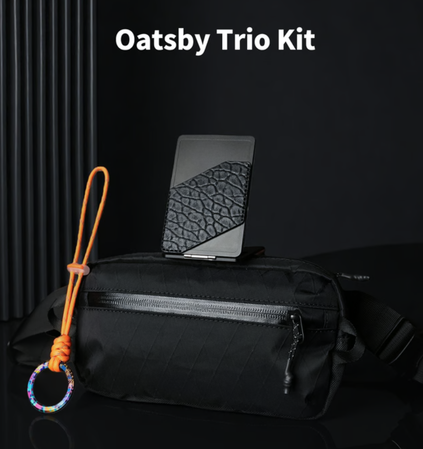 a black bag with a phone on top