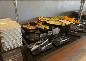 a buffet with different food items on it