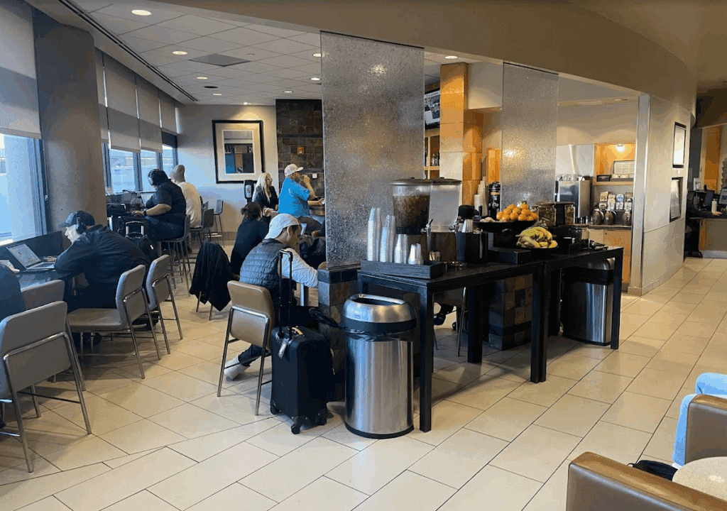 people sitting at a table in a restaurant