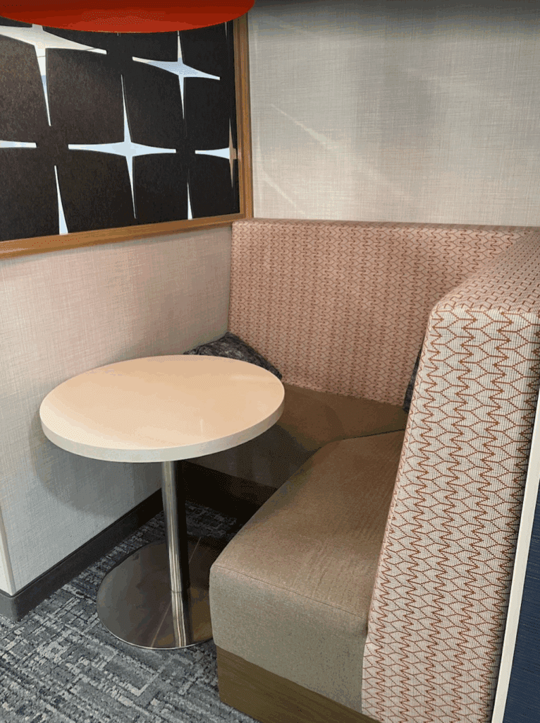 a table and chair in a booth