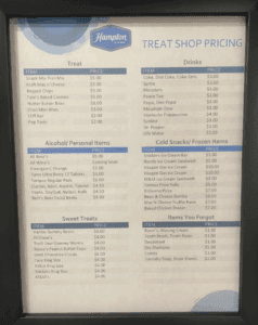 a price list on a sign