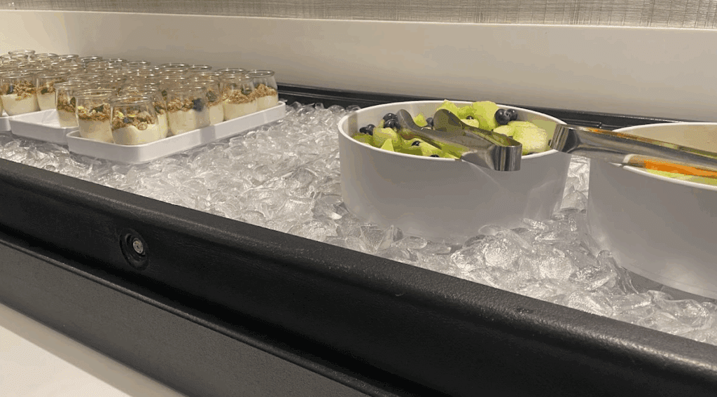 a bowl of fruit and a bowl of ice cream