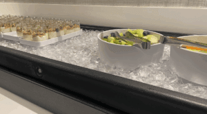 a bowl of fruit and a bowl of ice cream