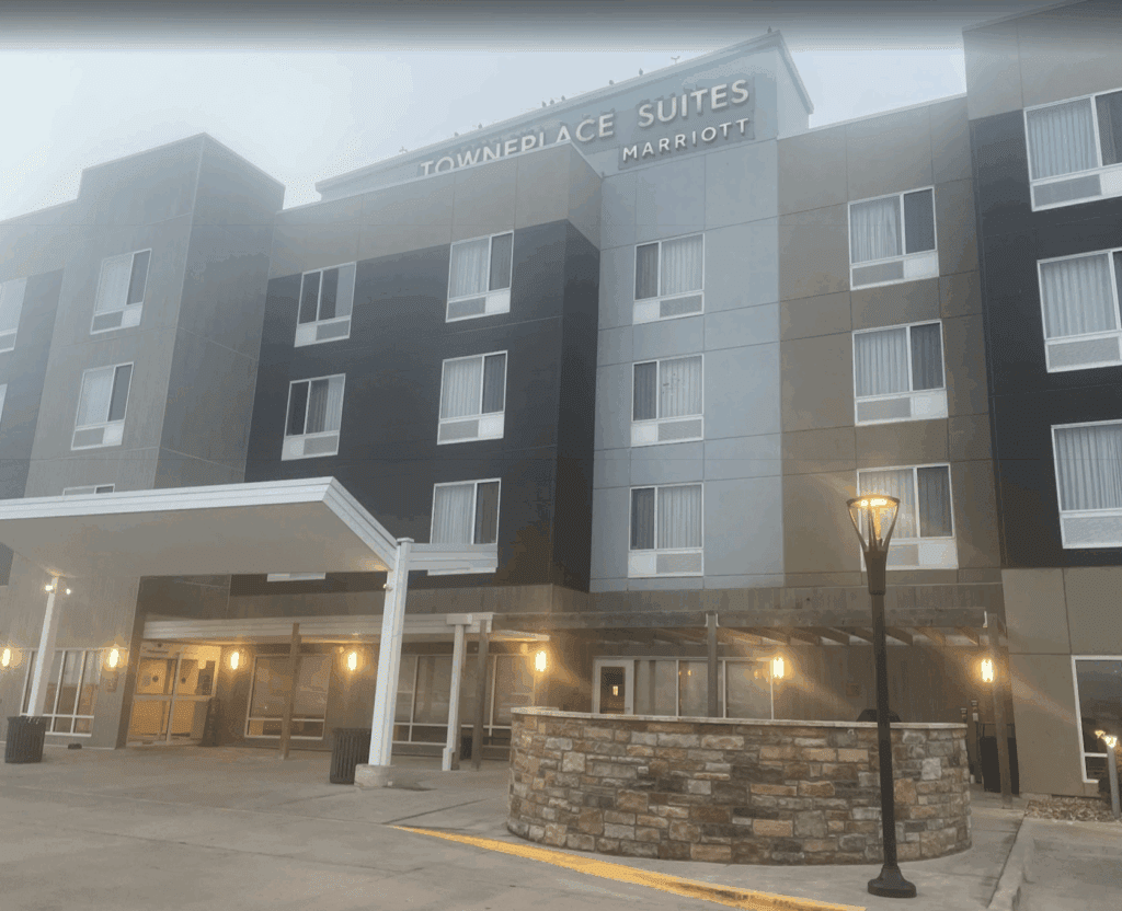 a building with a stone wall and a stone wall