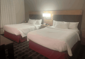 two beds in a hotel room