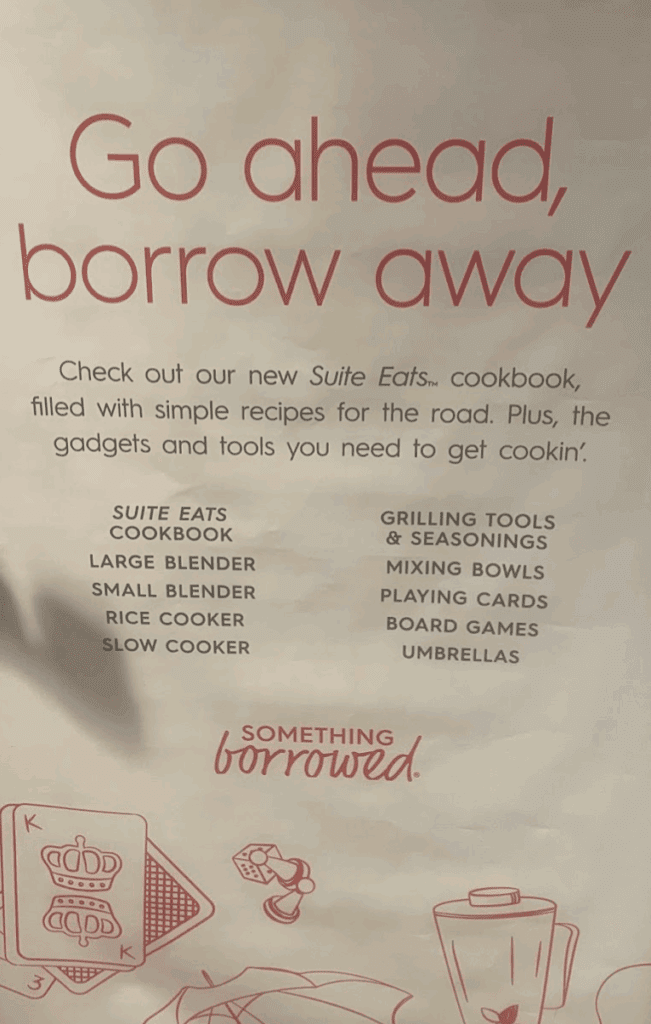 a white sign with red text