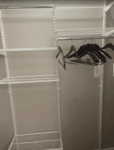 a clothes swingers on a rack