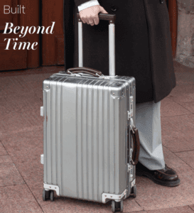 a person holding a suitcase