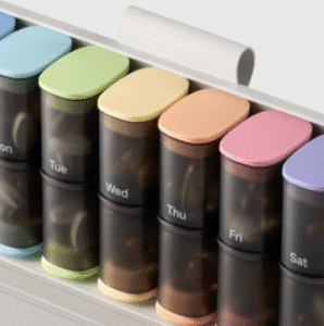 a row of pills in containers