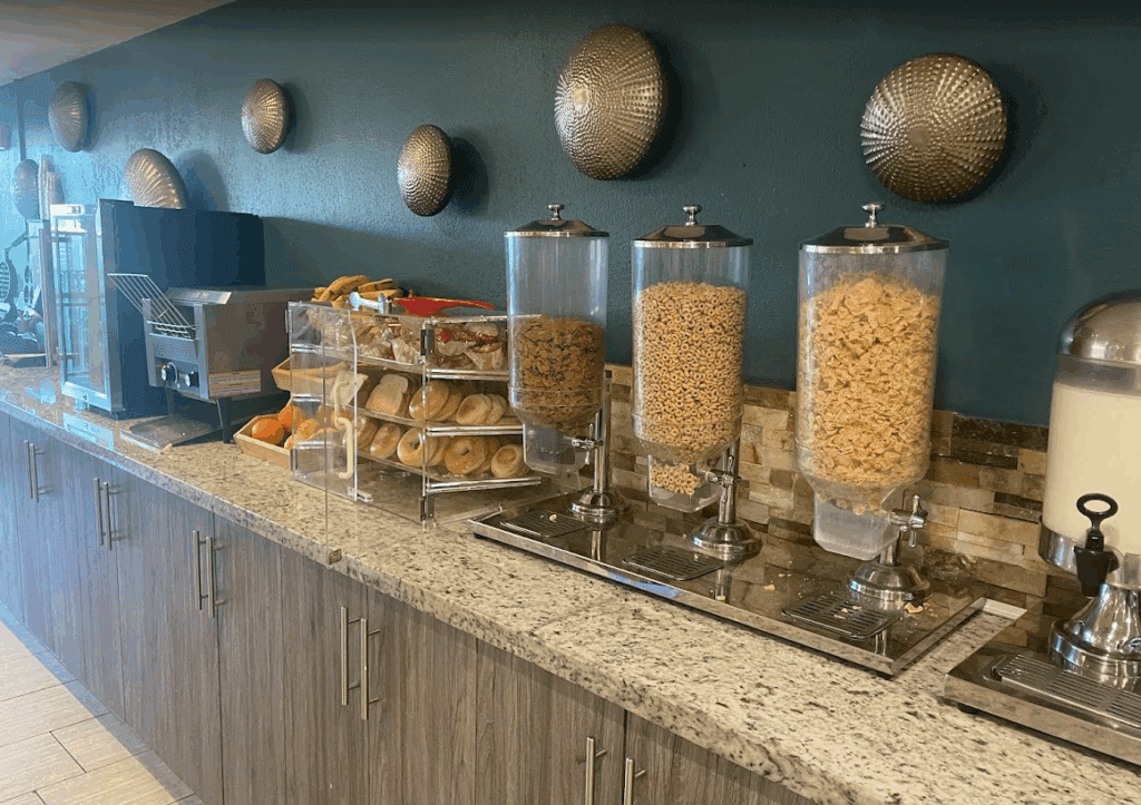 a breakfast buffet with food in containers