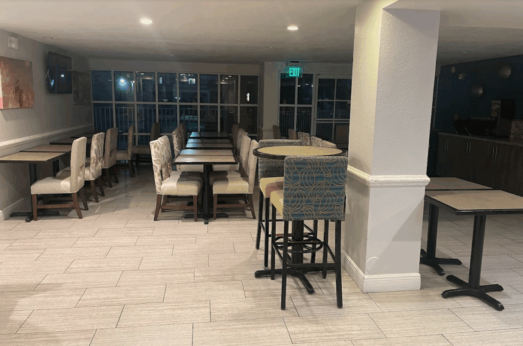 a room with tables and chairs