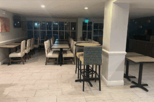 a room with tables and chairs