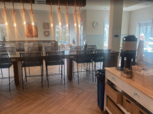 a room with a table and chairs