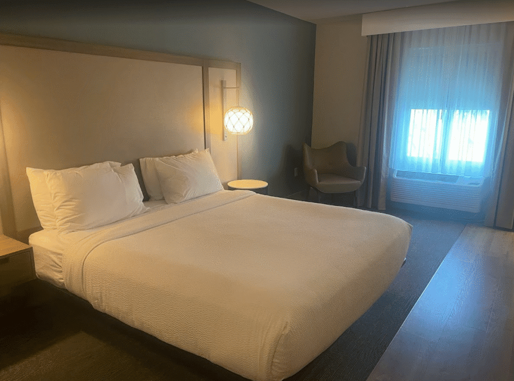 a bed in a hotel room