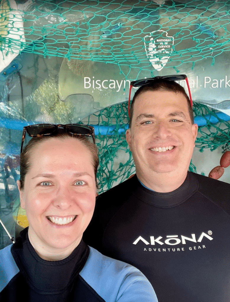 a man and woman smiling for a picture