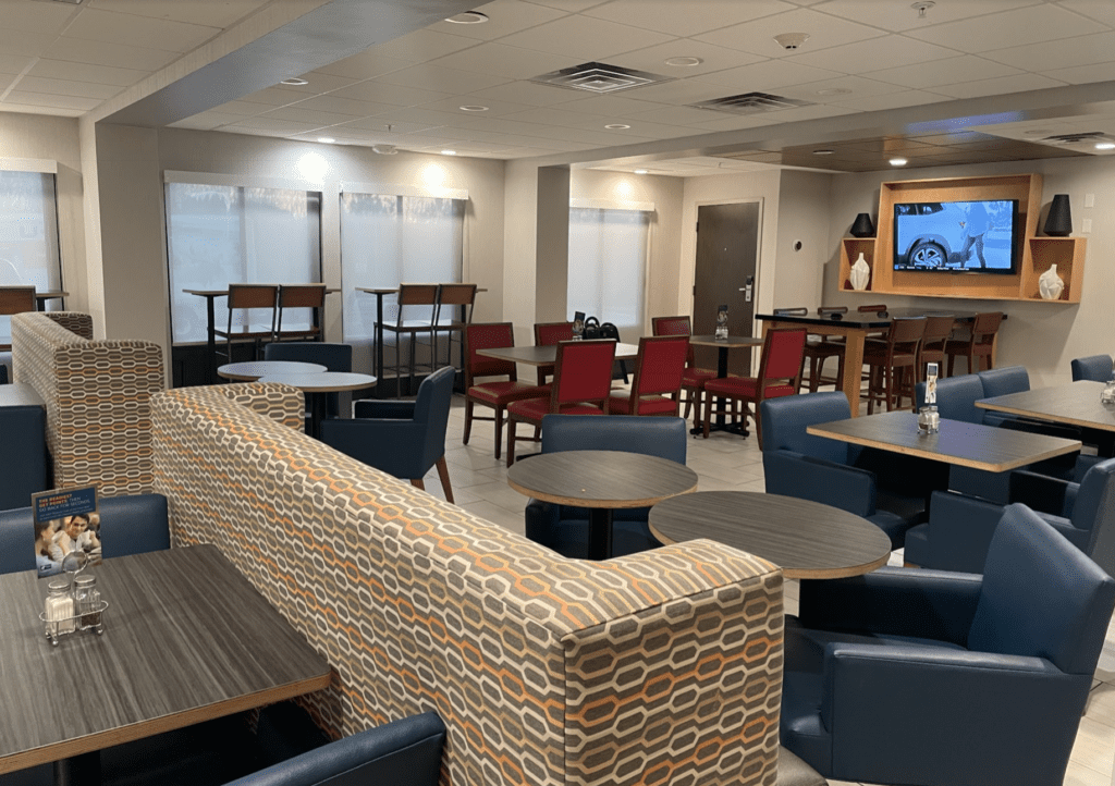 a room with tables and chairs