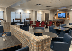 a room with tables and chairs