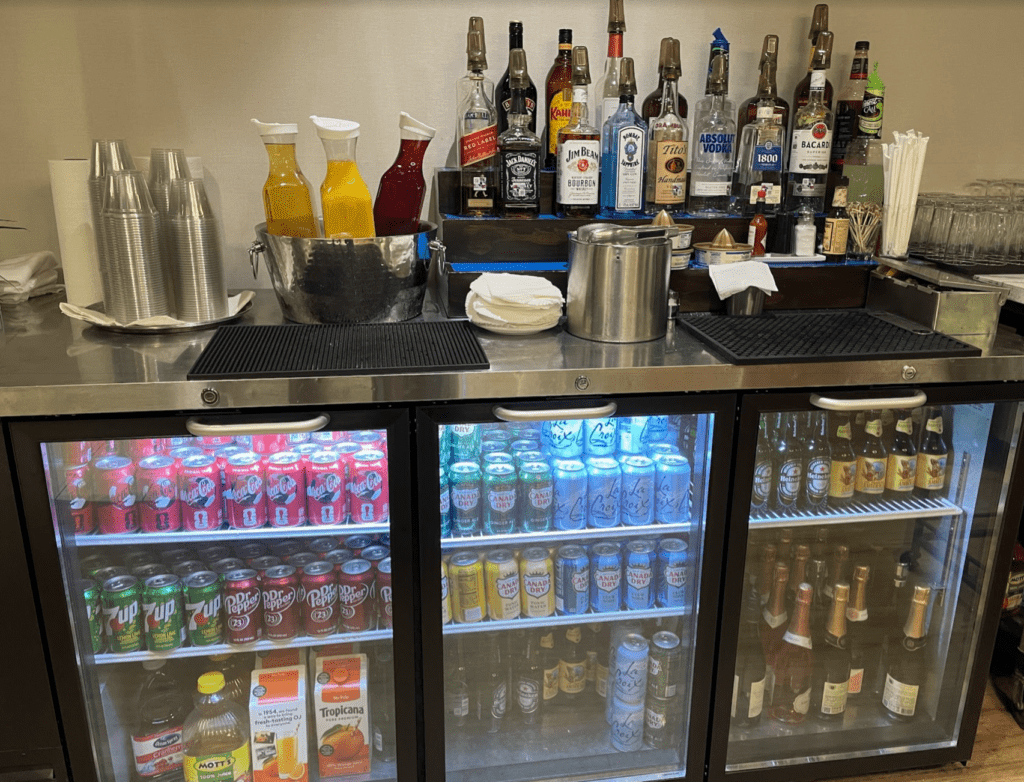 a bar with drinks and beverages