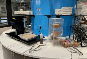 a counter with plates and cups on it