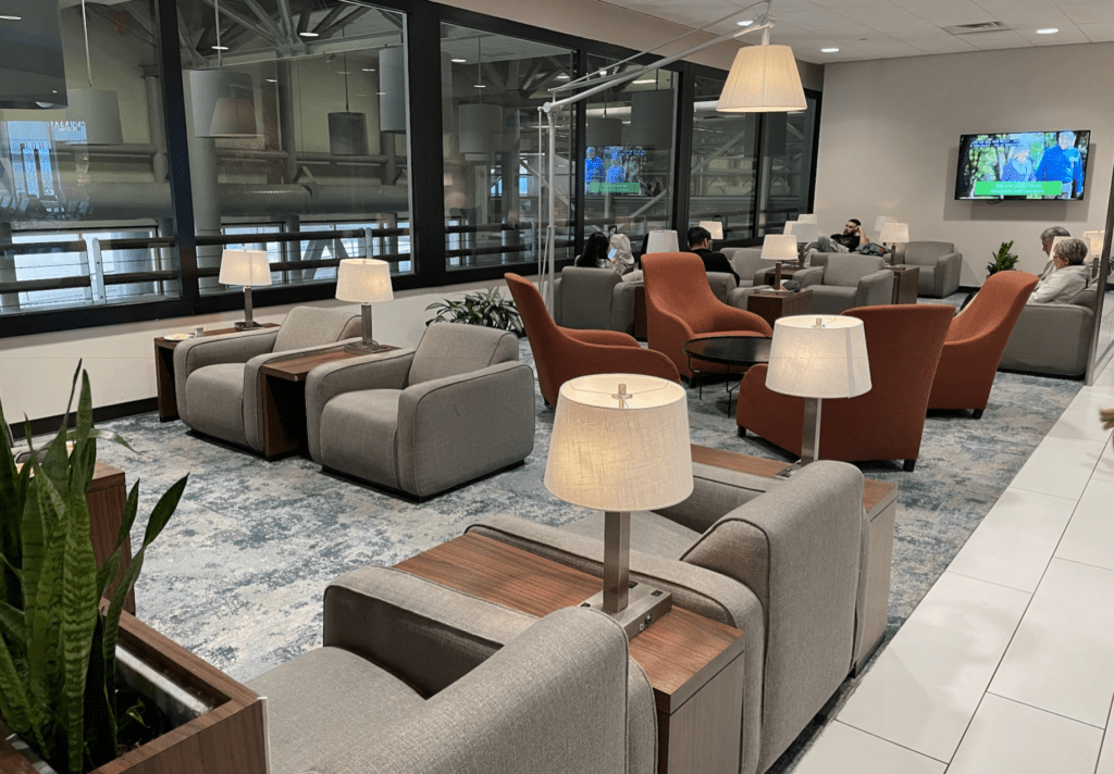 a room with chairs and tables