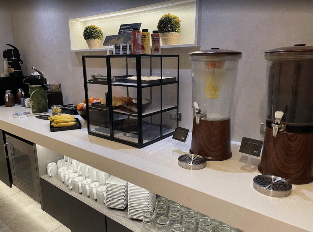 a counter with drinks and beverages on it