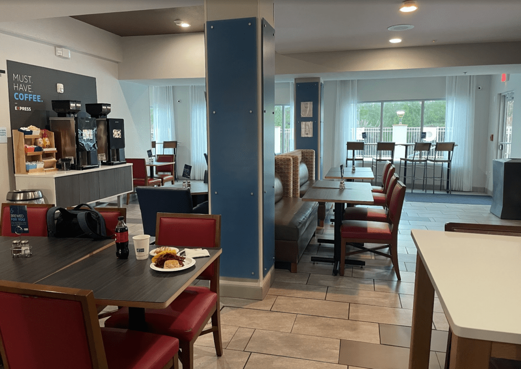 a room with a table and chairs