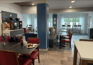 a room with a table and chairs